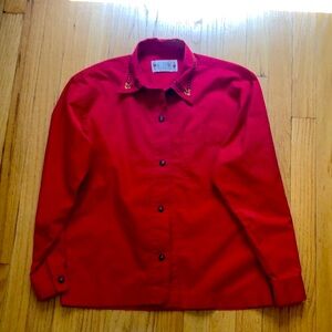 Beautiful red color cotton blouse by Melbourne. Size medium.